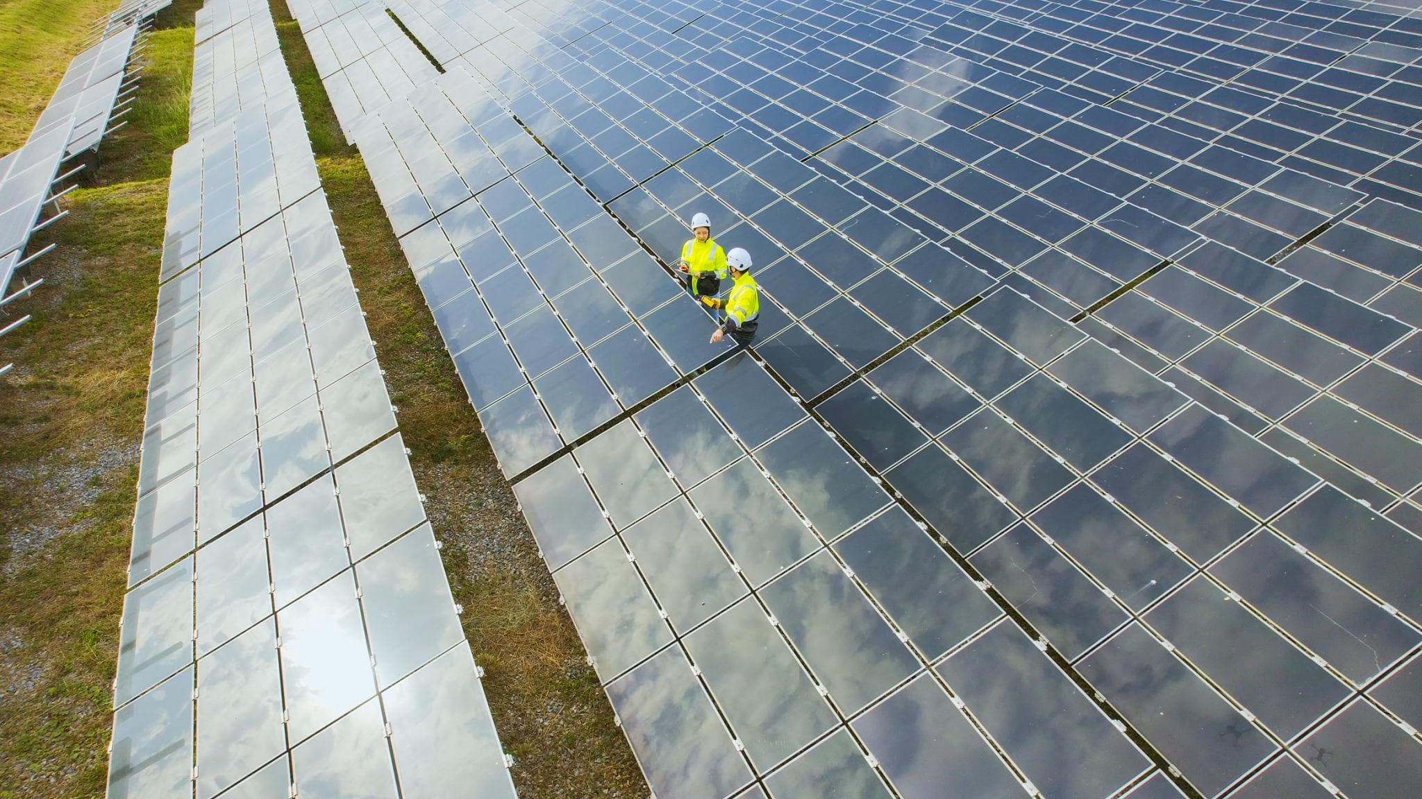 Clean solar panels on a rooftop in Karachi at golden hour